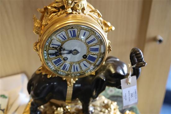 A late 19th century French bronze and ormolu mantel clock, height 17in.
